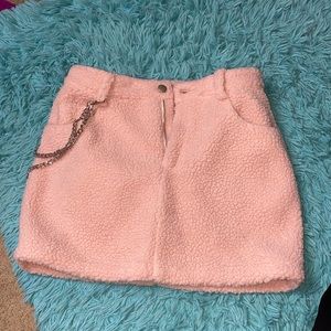 Pink fur skirt with silver chain